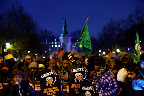 Protesters attend a demonstration against an immigration bill at the Place de la Republique in Paris, France, December 18, 2023.