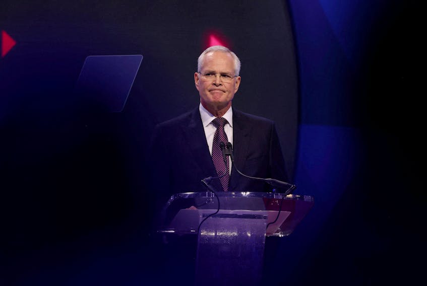 Darren Woods, CEO of ExxonMobil, reacts at the Asia-Pacific Economic Cooperation (APEC) CEO Summit in San Francisco, California, U.S., November 15, 2023.