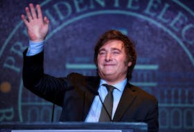 Argentine president-elect Javier Milei addresses supporters after winning Argentina's runoff presidential election, in Buenos Aires, Argentina November 19, 2023.