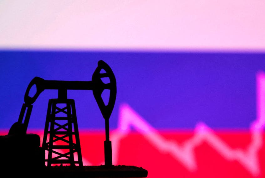 Russian flag with stock graph and an oil pump jack miniature model are seen in this illustration taken October 9, 2023.