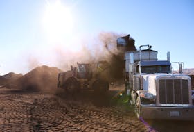 Fresh compost made from food scraps and green waste is loaded onto a truck before being sent to a farm at Recology Blossom Valley Organics North near Vernalis, California, U.S., November 10, 2022. 
