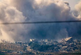 Smoke from an explosion rises in Gaza, after a temporary truce between Israel and the Palestinian Islamist group Hamas expired, as seen from southern Israel, December 2, 2023.