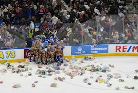The Edmonton Oil Kings celebrate the first goal of the game against the Everett Silvertips on Friday, Dec. 1, 2023 in Edmonton. The unique theme jerseys the Oil Kings are wearing is part of the 16th annual Teddy Bear Toss.
