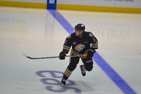 Isaac Vos, 6, patrols the blue-line for the Charlottetown Islanders in a Quebec Major Junior Hockey League (QMJHL) game at Eastlink Centre earlier this season. Vos, from Sherwood, scored his first goal of the season and added an assist in the Islanders’ 4-2 road win over the Shawinigan Cataractes on Dec. 1. Jason Simmonds • The Guardian