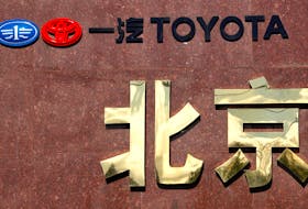 A sign is seen outside a Tianjin Faw Toyota Motor Co. Ltd showroom, a joint venture between China's Tianjin FAW Xiali Automobile Co Ltd and Japan's automaker Toyota Motor Corp, in central Beijing October 9, 2012.
