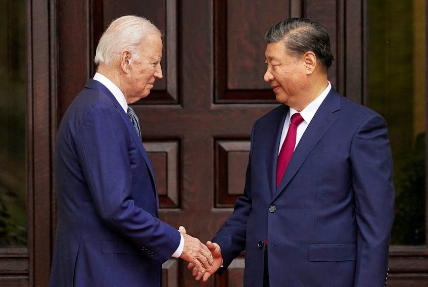 U.S. President Joe Biden shakes hands with Chinese President Xi Jinping at Filoli estate on the sidelines of the Asia-Pacific Economic Cooperation (APEC) summit, in Woodside, California, U.S., November 15, 2023.