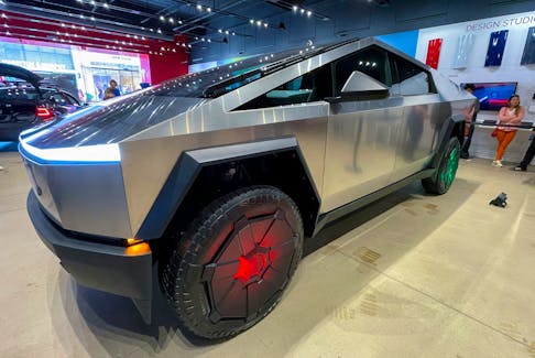 Tesla's new Cybertruck is shown on display at a Tesla store in San Diego, California, U.S., December 9, 2023.