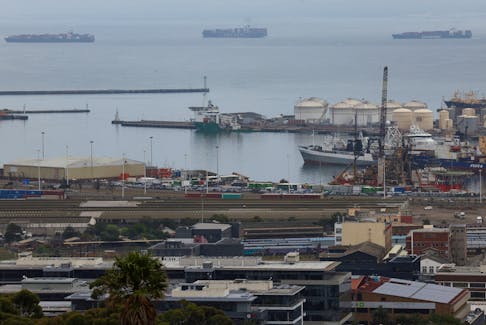 Container ships are seen outside the harbour as workers at South Africa's state-owned logistics firm Transnet continue to protest outside the Port of Cape Town on their nationwide strike action that could paralyse ports and freight rail services in Cape Town, South Africa, October 17, 2022.