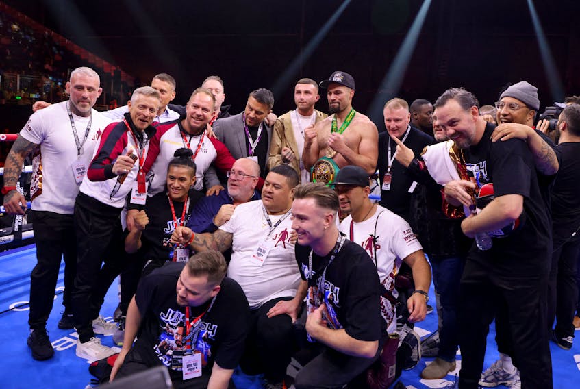Boxing - Deontay Wilder v Joseph Parker - Kingdom Arena, Riyadh, Saudi Arabia - December 24, 2023 Joseph Parker celebrates with his team after winning his fight against Deontay Wilder