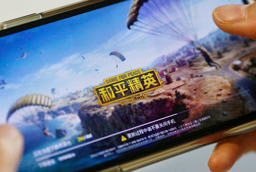"Game for Peace", Tencent's alternative to the blockbuster video game "PlayerUnknown's Battlegrounds" (PUBG) in China, is seen on a mobile phone in this illustration picture taken May 13, 2019. 