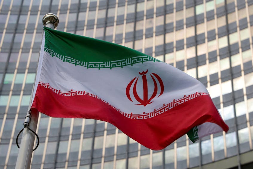 The Iranian flag flutters in front of the International Atomic Energy Agency (IAEA) organisation's headquarters in Vienna, Austria, June 5, 2023.