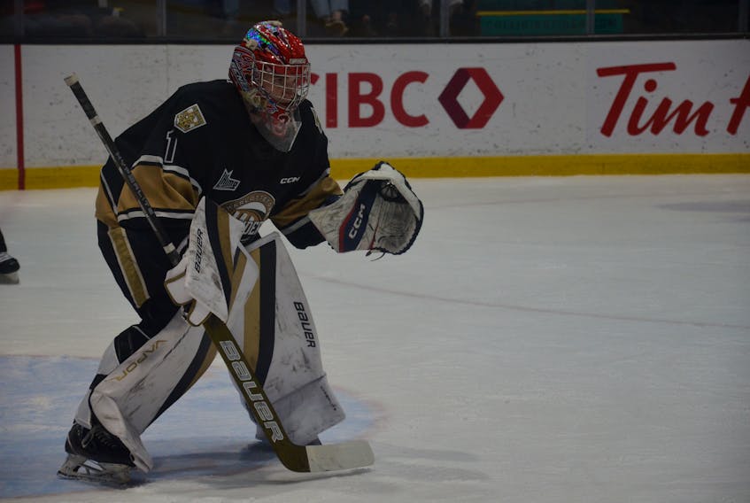 Charlottetown Islanders goaltender Carter Bickle prepares for a faceoff during a Quebec Maritimes Junior Hockey League game at Eastlink Centre in Charlottetown earlier this season. Bickle was named the first star in the Islanders’ 2-1 road win over the Halifax Mooseheads on Dec. 28. Jason Simmonds • The Guardian