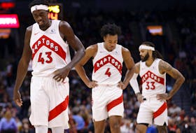 Pascal Siakam, from left, Scottie Barnes and Gary Trent Jr. of the Toronto Raptors walk up court during the first half of an exhibition game against the Cairns Taipans at Scotiabank Arena on Oct. 15, 2023 in Toronto. 
