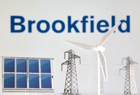 File photo: Miniatures of windmill, solar panel and electric pole are seen in front of Brookfield Renewable logo in this illustration taken January 17, 2023.