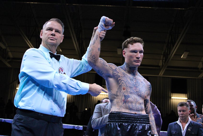 World Boxing Council referee Joel Scobie officially declares Ryan Rozicki of Sydney Forks the winner of Saturday's main event in North Sydney. Rozicki defeated Olanrewaju Durodola only one minute and 47 seconds into the fight, securing a berth to challenge for a WBC world cruiserweight championship. LUKE DYMENT/CAPE BRETON POST