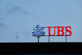 A UBS logo is seen next to Credit Suisse at the Bahnhofstrasse before a news conference of Swiss bank UBS in Zurich Switzerland, August 30, 2023. 