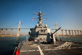 The U.S. Navy Arleigh Burke-class guided-missile destroyer USS Carney transits the Suez Canal, Egypt October 18, 2023.  U.S. Navy/Mass Communication Specialist 2nd Class Aaron Lau/Handout via