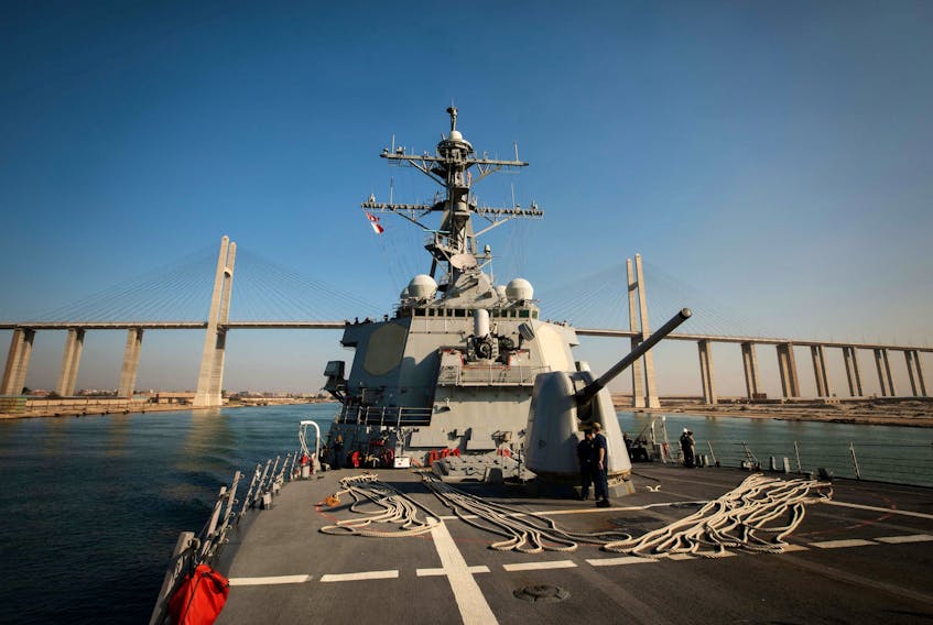 The U.S. Navy Arleigh Burke-class guided-missile destroyer USS Carney transits the Suez Canal, Egypt October 18, 2023.  U.S. Navy/Mass Communication Specialist 2nd Class Aaron Lau/Handout via