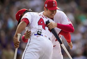Shohei Ohtani of the Los Angeles Angeles, right, embraces Juan Soto, then of the Washington Nationals. in 2021.