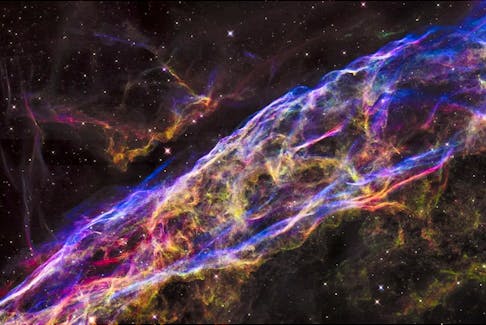 Called the Veil Nebula, the debris is one of the best-known supernova remnants, deriving its name from its delicate, draped filamentary structures. The entire nebula is 110 light-years across, covering six full moons on the sky as seen from Earth. This image is dated September, 2015.