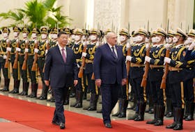 Chinese President Xi Jinping and Belarusian President Alexander Lukashenko review the honour guard during a welcome ceremony at the Great Hall of the People in Beijing, China March 1, 2023. cnsphoto via