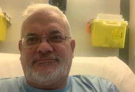 Dave Stewart, a reporter with SaltWire, sits in his hospital bed in September after having three mini-strokes. He has almost fully recovered but the process has been complicated by not having a primary care provider. Dave Stewart • The Guardian