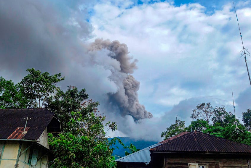 Mount Marapi volcano spews volcanic ash as seen from Nagari Sungai Pua, in Agam, West Sumatra province, Indonesia, December 3, 2023, in this photo taken by Antara Foto. Antara Foto/Septiyadi/via