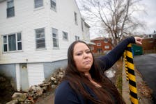 FOR RANKIN STORY:
Jennifer Corbin stands in front of her Fairview apartment building in Halifax Friday December 1, 2023. On a fixed lease, she is facing eviction at the end of the month...her landlord is also seeing a significant increase in rent.

TIM KROCHAK PHOTO