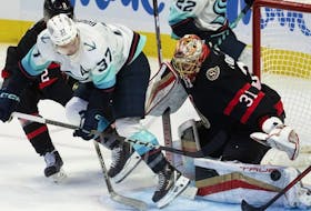 Seattle Kraken centre Yanni Gourde tries a backhand shot on Ottawa Senators goaltender Anton Forsberg during third- period NHL action, Saturday, Dec. 2, 2023 in Ottawa. Forsberg recorded a shutout as the Senators bounced back after a disappointing loss in Columbus on Friday.