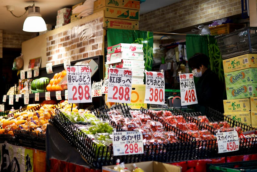 A view of a vegetable stand with prices at a supermarket in Tokyo, Japan, March 24, 2023.
