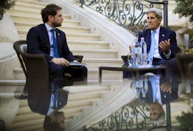 U.S. Secretary of State John Kerry (R) talks to State Department Chief of Staff Jon Finer during a meeting with members of the U.S. delegation at the garden of the Palais Coburg hotel where the Iran nuclear talks meetings are being held in Vienna, Austria July 10, 2015. Iran and major powers gave themselves until Monday to reach a nuclear agreement, their third extension in two weeks, as Tehran accused the West of throwing up new stumbling blocks to a deal.
