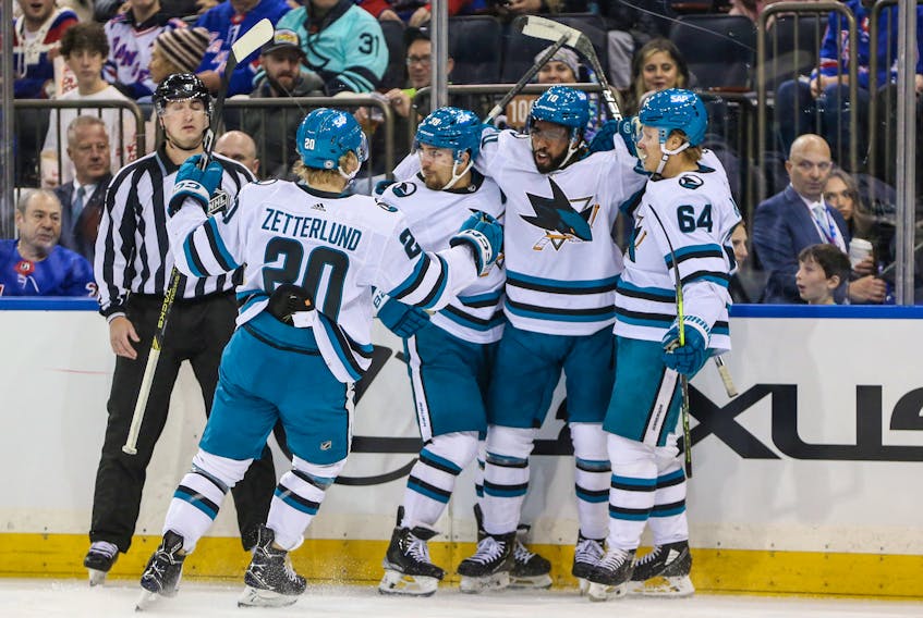 Dec 3, 2023; New York, New York, USA; San Jose Sharks left wing Anthony Duclair (10) is greeted by his teammates after scoring a goal in the first period against the New York Rangers at Madison Square Garden. Mandatory Credit: Wendell Cruz-USA TODAY Sports