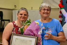 Ashley Hingley, left, helped host a celebration for Cindy LeGoffic Loane, who was retiring after 50 years of volunteering with the Matthew 25 Windsor and District Food Bank. Hingley officially took over as the organization’s co-ordinator earlier this summer.