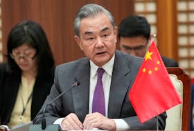 Chinese Foreign Minister Wang Yi speaks during the 10th trilateral foreign ministers' meeting in Busan, South Korea, Sunday, Nov. 26, 2023. Ahn Young-joon/Pool via