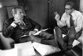 (NYT38) IN FLIGHT -- May 26, 2004 -- KISSINGER-TAPES -- President Nixon and Henry Kissinger, his national security adviser and secretary of state,  have a discussion aboard Air Force One as it headed to Brussels on June 26, 1970. (White House Photo/The New York Times)