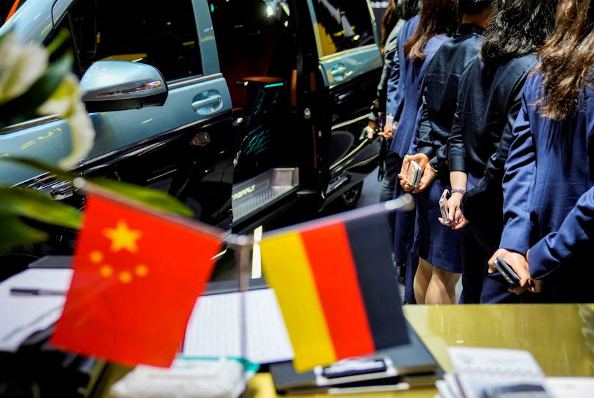A view shows the flags of China and Germany at a booth of a German automaker at the Auto Shanghai show, in Shanghai, China, April 19, 2023.
