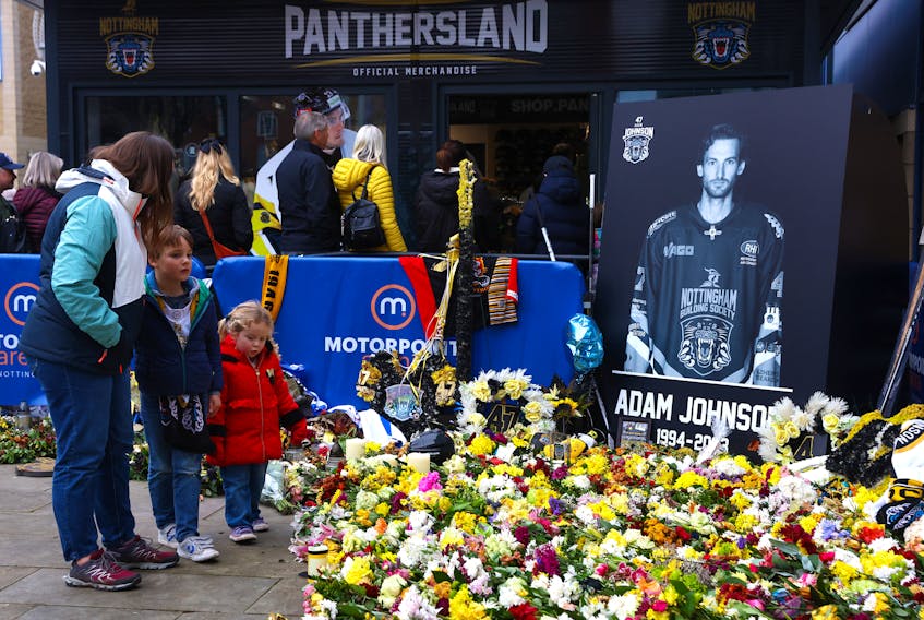 Ice Hockey - Elite Ice Hockey League - Nottingham Panthers v Belfast Giants - National Ice Centre, Nottingham, Britain - November 26, 2023 A tribute to Nottingham Panthers' Adam Johnson is pictured outside the stadium before the match