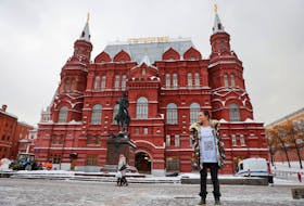 Maria Andreeva, whose husband was mobilised in October 2022 to join the Russian armed forces involved in a military campaign in Ukraine, poses for a picture in front of the State Historical Museum in central Moscow, Russia, November 30, 2023.