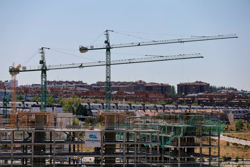 Cranes can be seen at a construction site in north Madrid, Spain, July 18, 2016.