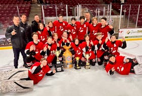 The Pownal Red Devils won the 26th Edd McNeill Memorial hockey tournament in Summerside on Dec. 2. Pownal defeated the Fredericton Caps 5-2 in the championship game of the event that featured 16 under-13 AAA teams from across the Maritimes. Members of the Red Devils are, front row, from left, Blake Pierce and Patrick Gallant. Second row, from left, are Harris MacEwen, Hudson English, Nolan Denomme, Emmett Clinton, Luca MacAllum, Hudson MacEwen, Cooper Richards and Rory Christian. Third row, from left, are Connor Breedon, Sully Campbell, Gavin Hartman, Max Keough, Nick Liu, Kohl Enman and Luke Nishimura. Back row are coaches Jeff Keough, left, Adam Campbell, Darcy Clinton and Matt MacEwen. - Contributed