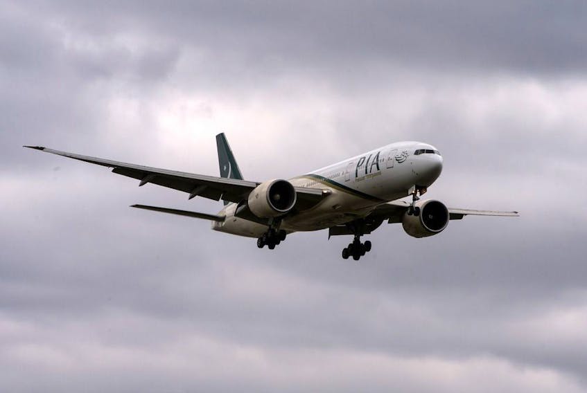 A Pakistan International Airlines flight prepares to land at Toronto Pearson International Airport. At least eight PIA crew members have disappeared during layovers in Toronto in the last two years.