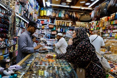 A Muslim pilgrim shops in Mecca, Saudi Arabia July 5, 2022.