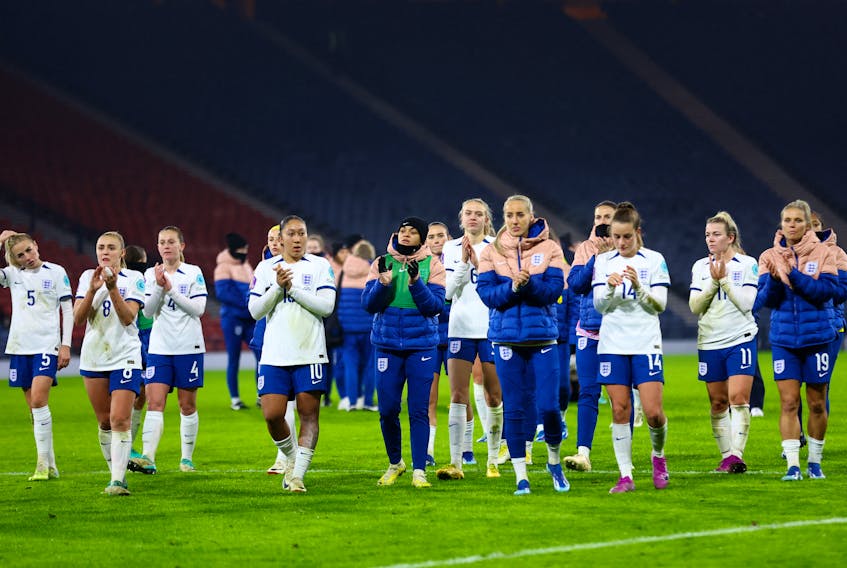 Soccer Football - UEFA Women's Nations League - Group A - Scotland v England - Hampden Park, Glasgow, Scotland, Britain - December 5, 2023 England players applaud fans as they look dejected after Team GB failed to qualify for the Paris 2024 Olympics