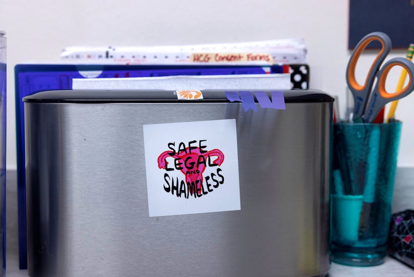 Pro-choice stickers adorn staff desks at Houston Women's Reproductive Services in Texas, U.S., October 1, 2021.