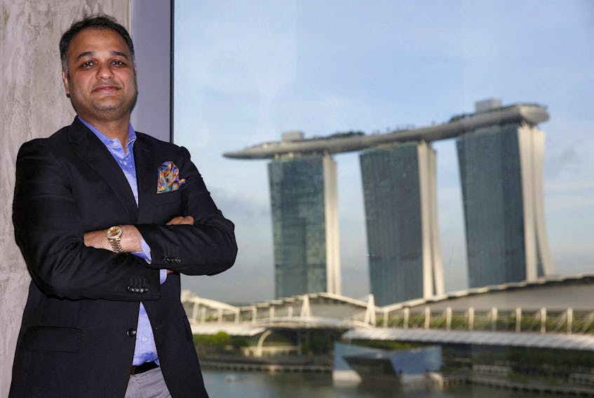 Prateek Gupta poses in his Singapore office December 11, 2015.