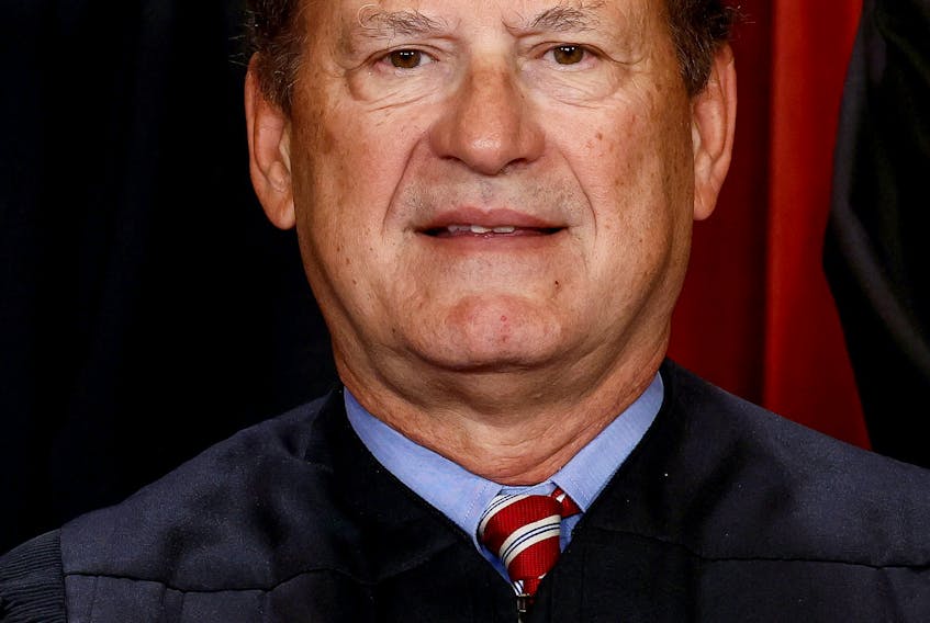 U.S. Supreme Court Associate Justice Samuel A. Alito Jr. poses during a group portrait at the Supreme Court in Washington, U.S., October 7, 2022.