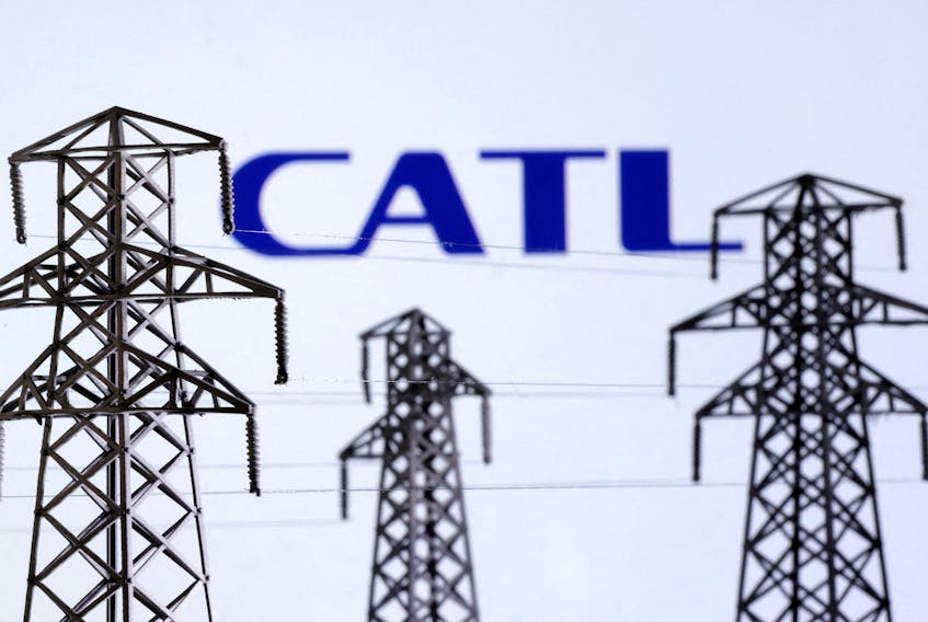 Electric power transmission pylon miniatures and CATL logo are seen in this illustration taken, December 9, 2022.