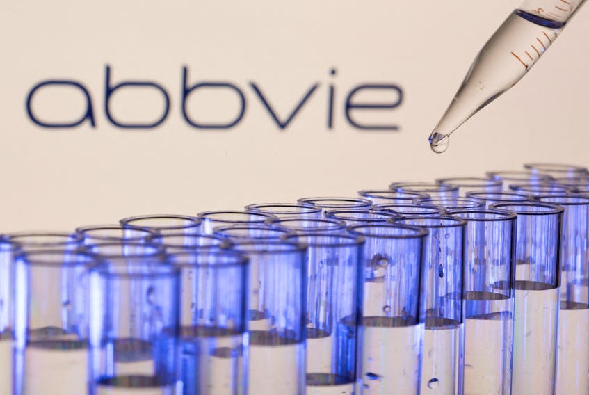 Test tubes are seen in front of a displayed Abbvie logo in this illustration taken, May 21, 2021.