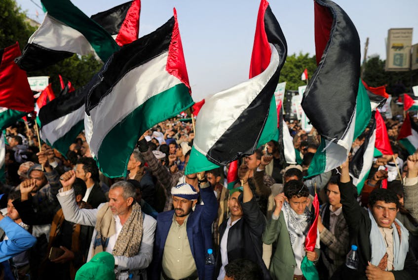 Houthi supporters rally to show support to Palestinian factions, in Sanaa, Yemen October 7, 2023.