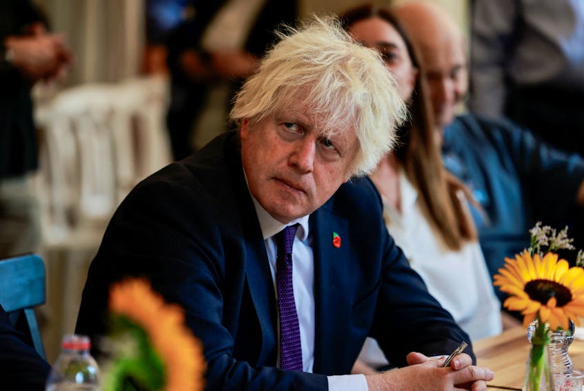 Former British Prime Minister Boris Johnson looks on as he meets with British-Israeli soldiers during a visit to Jerusalem, November 5, 2023.